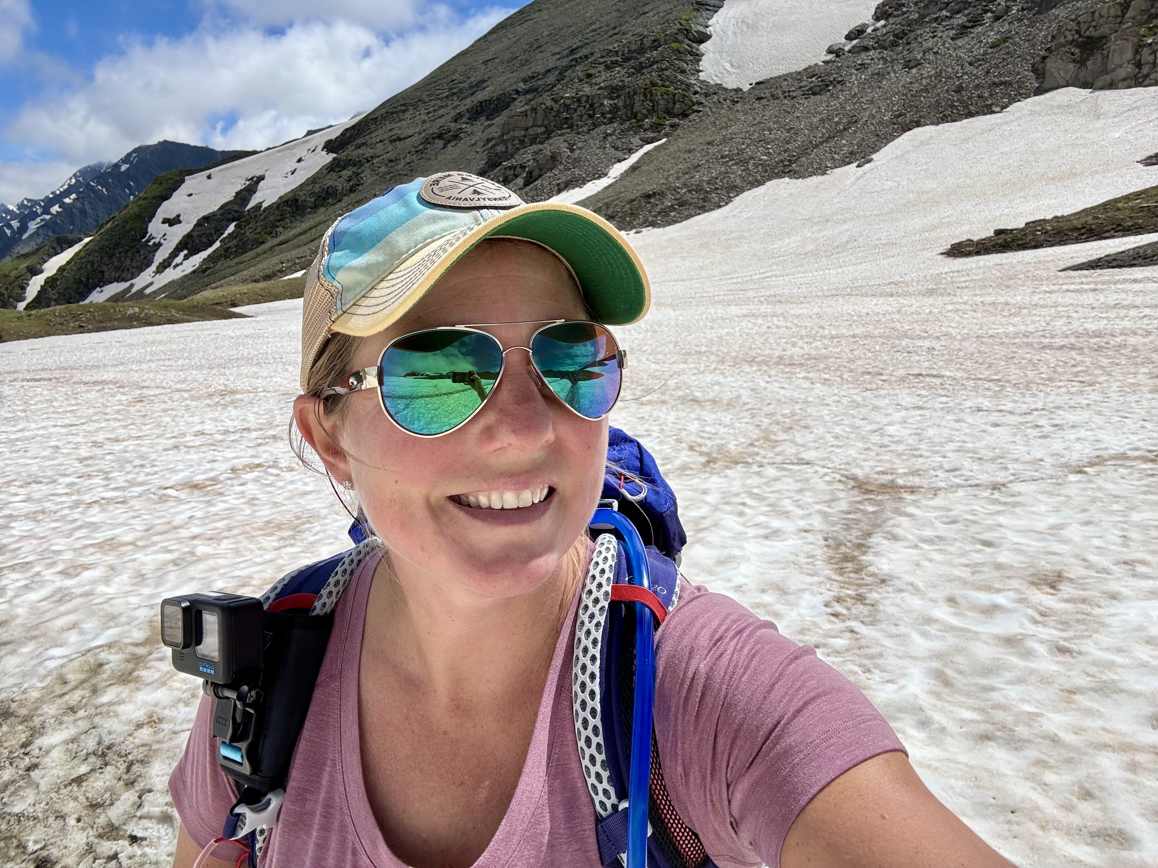 Hiking snowfields on the Tour du Mont Blanc