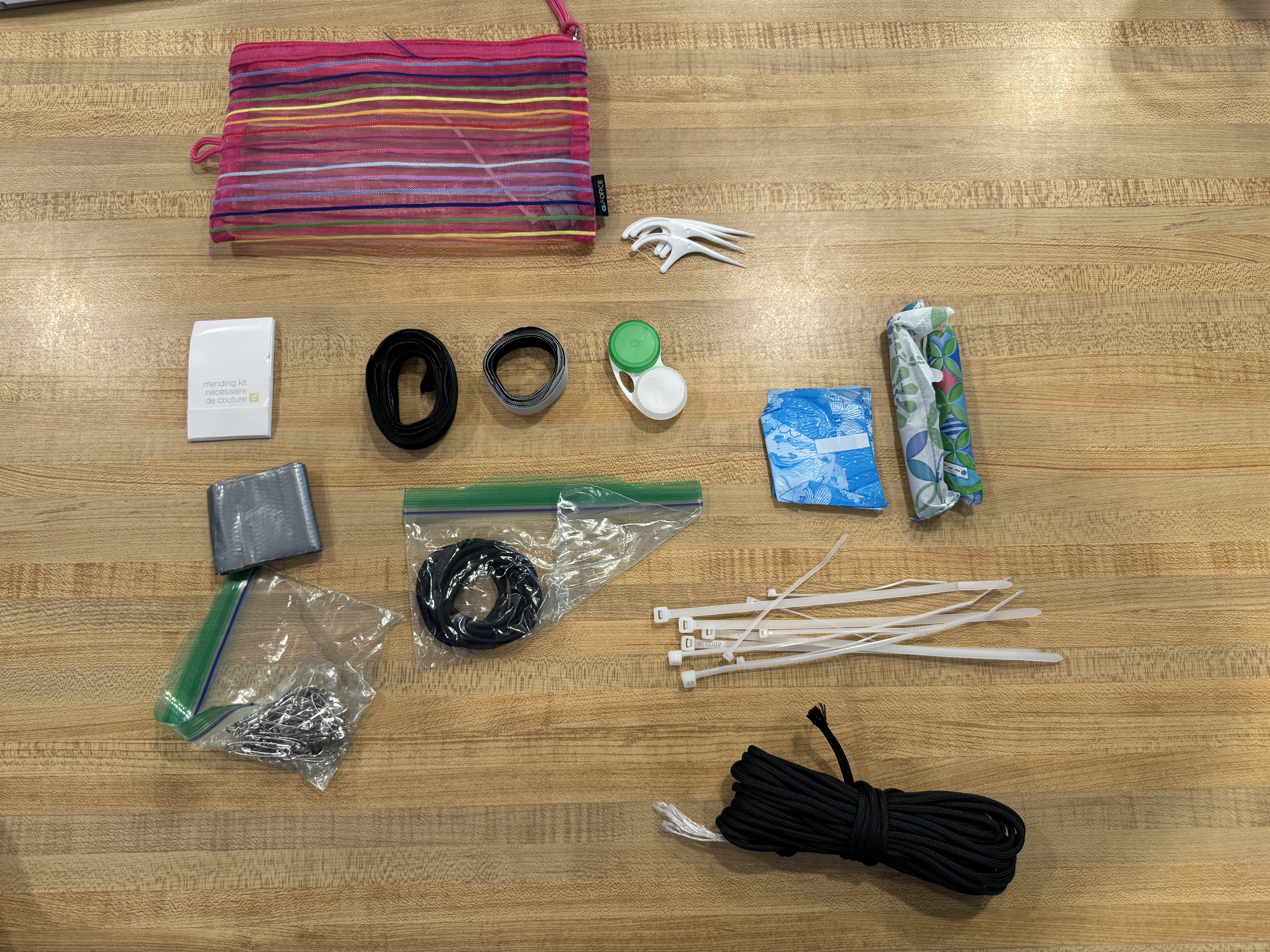 Small emergency repair kit for the Tour du Mont Blanc with duct tape, zip ties, paracord and safety pins